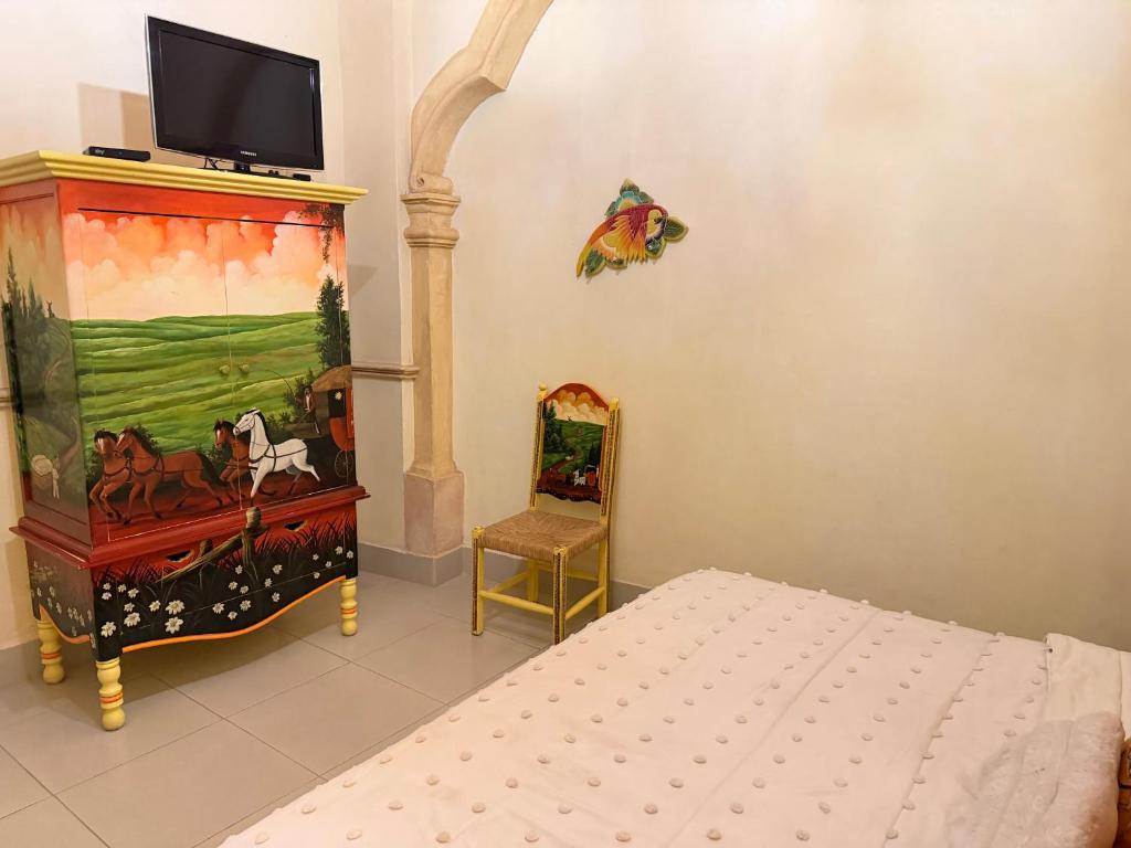 Habitación Carretas con arco de cantera y murales de paisaje — foto 5