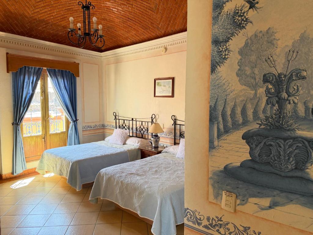 Habitación Celeste con concha de yesería y detalles en azul — foto 3